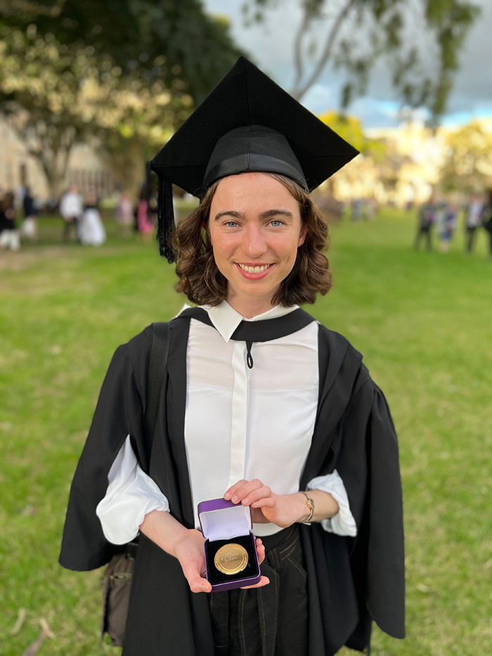 Sophie Coombs graduating at UQ.