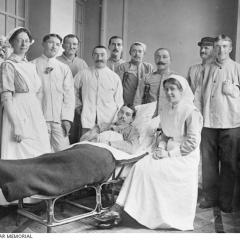 Nurses and patient at the Auxiliary Hospital Unit in Belgium. Image: Australian War Memorial.
