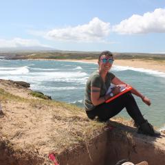 Georgie Wye recording the stratigraphic information for one of the excavation pits. 