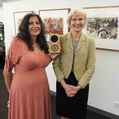 Dr Marianne Hanson and UQ Vice-Chancellor and President Professor Deborah Terry with the Nobel Peace Prize medal.