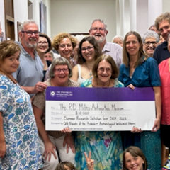 Cheque presentation by QFAAIA to RD Milns Antiquities Museum.